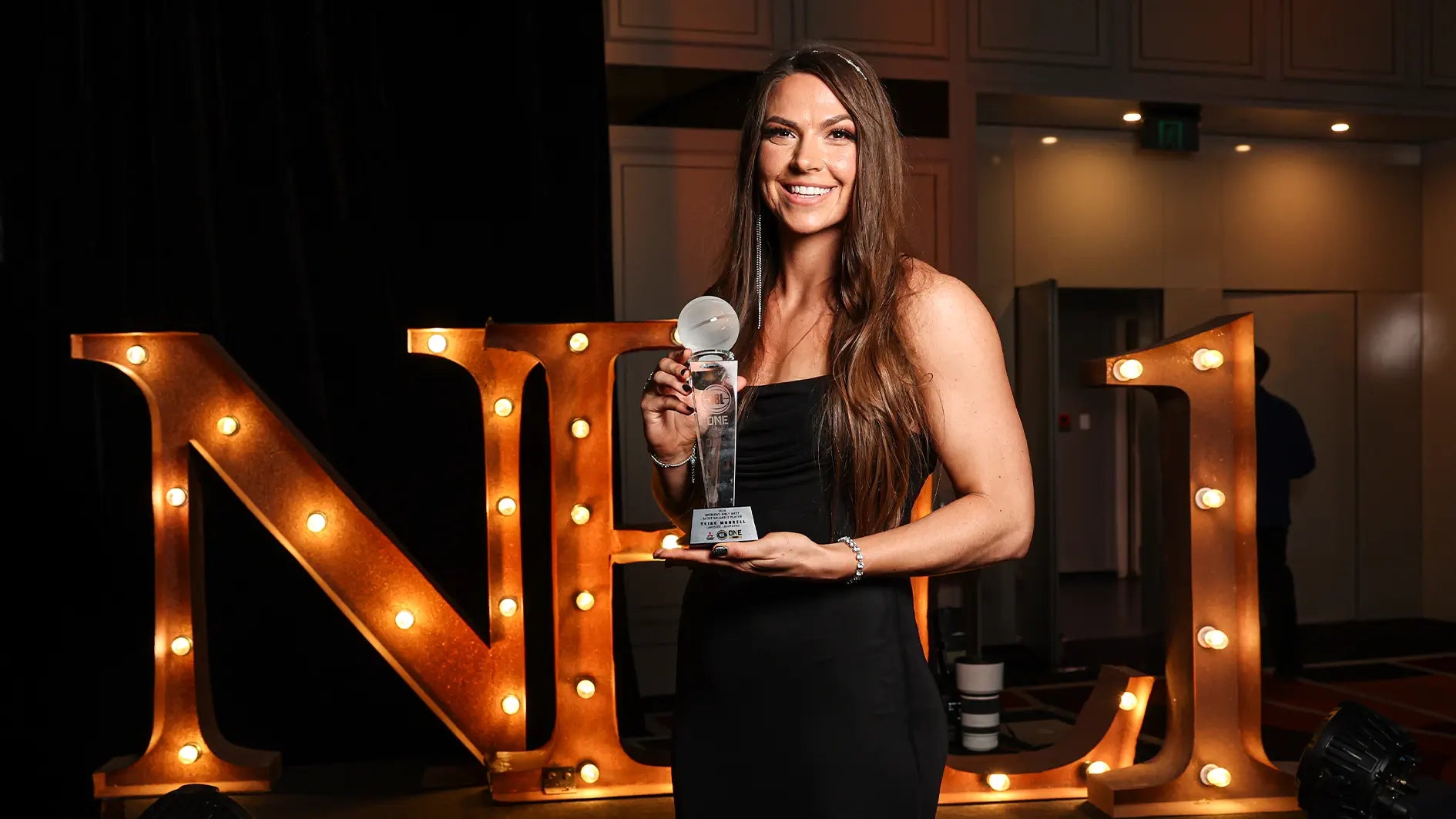 Teige Morrell holding the NBL1 MVP Trophy